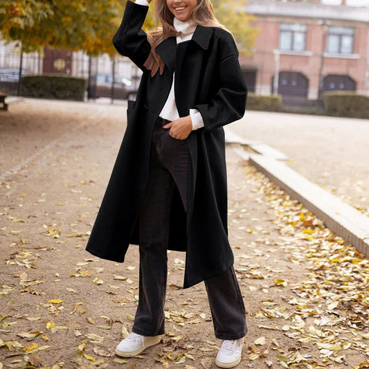 Manteau en laine allongé noir à col de costume.